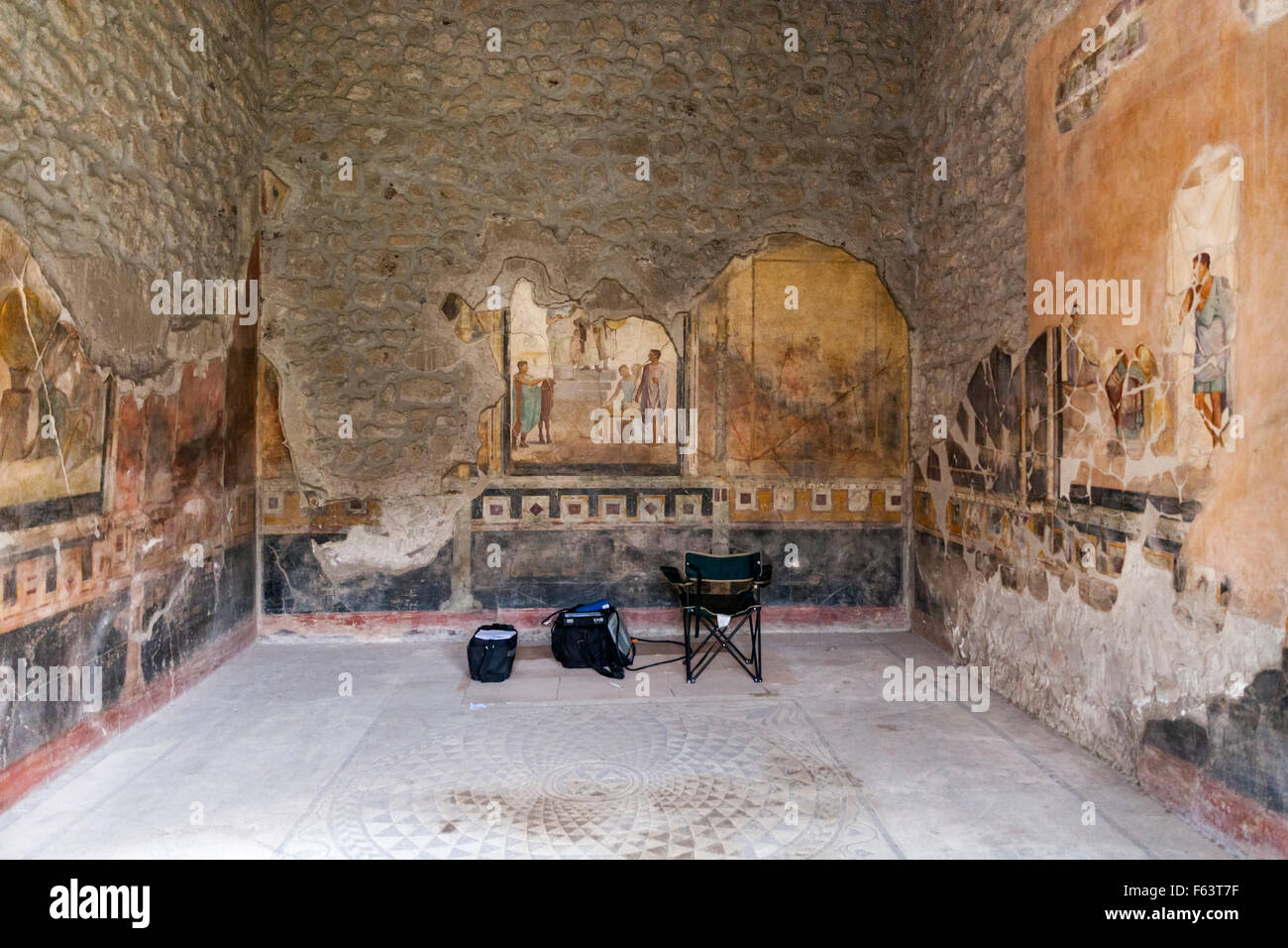 Fresco mural wall paintings at the Casa Degli Amorini Dorati, House of the Gilded Cupids, Pompeii are monitored and restored Stock Photo