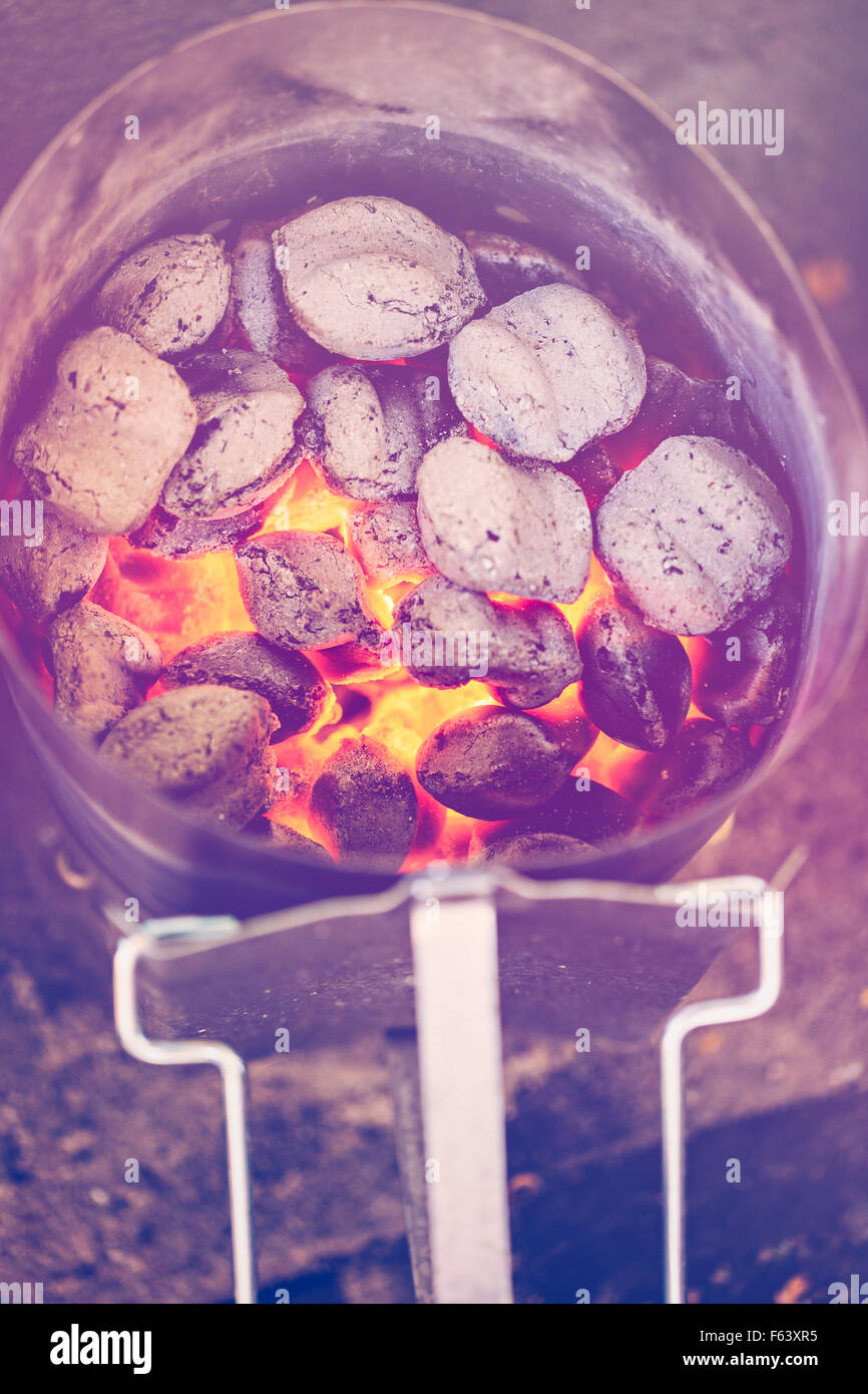 Charcoals in metal container prepared for barbecue grill Stock Photo