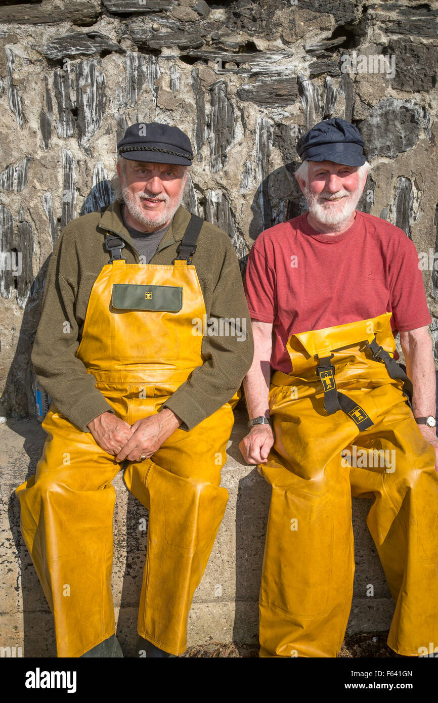 Fishermen extras on the set of filming Doc Martin in Port Issac, Cornwall Stock Photo