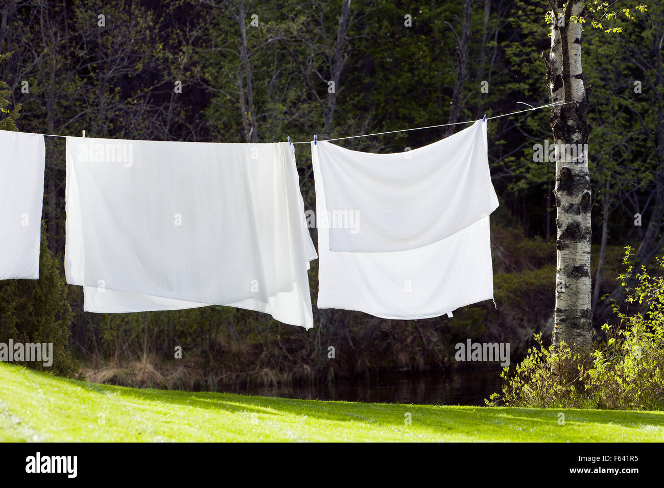 Sheets hung to dry Stock Photo Alamy