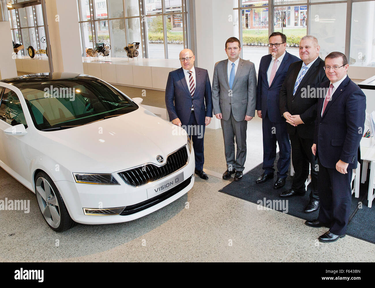 From left: Skoda Auto Board Chairman Bernhard Maier, President of the Chamber of Deputies of Czech Republic Jan Hamacek, Minister for Trade and Industry Jan Mladek, Governor of the Central Bohemia Region Milos Petera and Member of the Board of Management for Human Resources Management Bohdan Wojnar pose during their visit of Skoda Museum in Mlada Boleslav, Czech Republic, November 11, 2015. (CTK Photo/Rene Fluger) Stock Photo