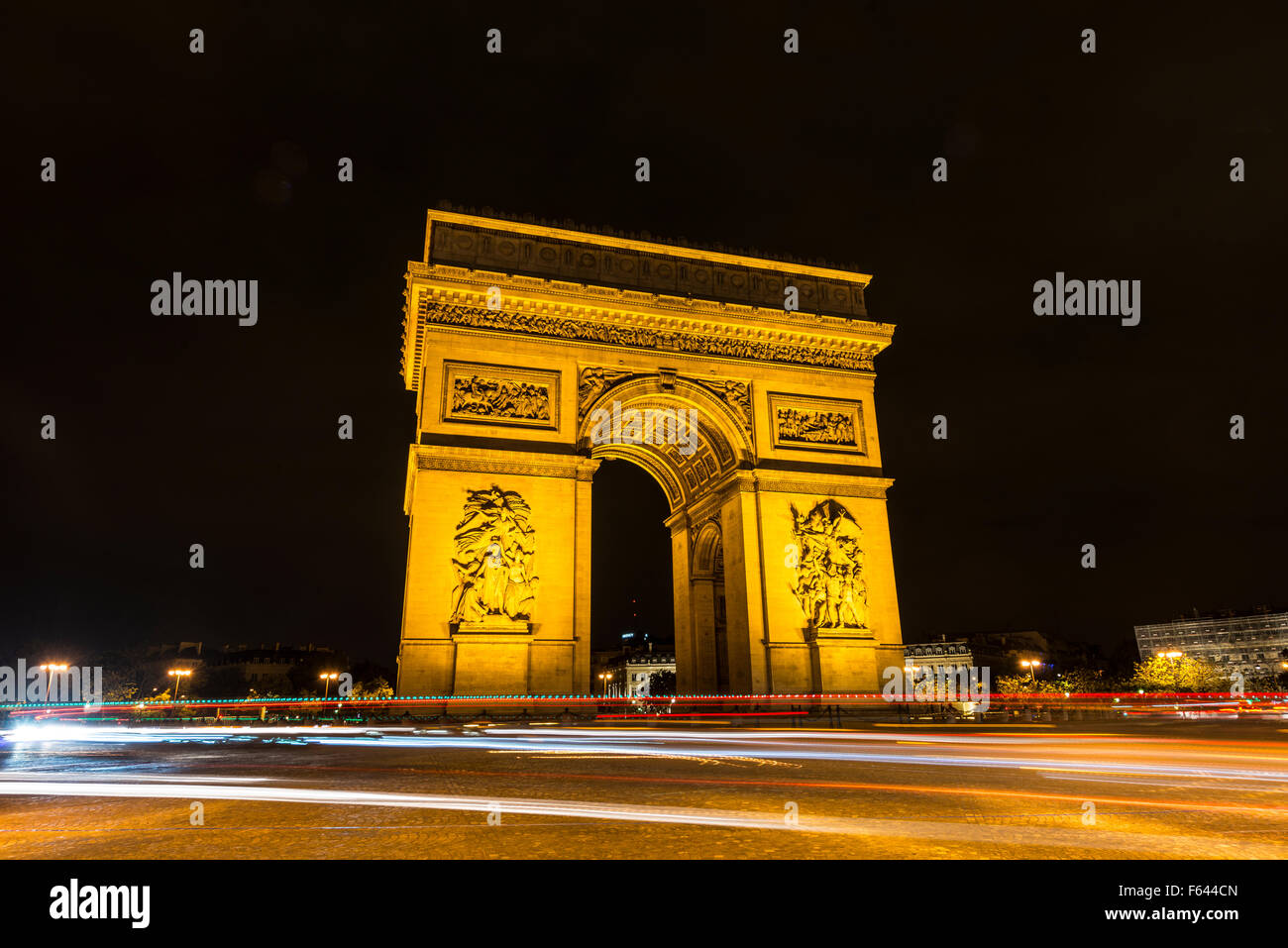 Triumphal Arch, Arc de Triomphe at night, trails of light, Place Charles de Gaulle, Paris, Ile-de-France, France Stock Photo