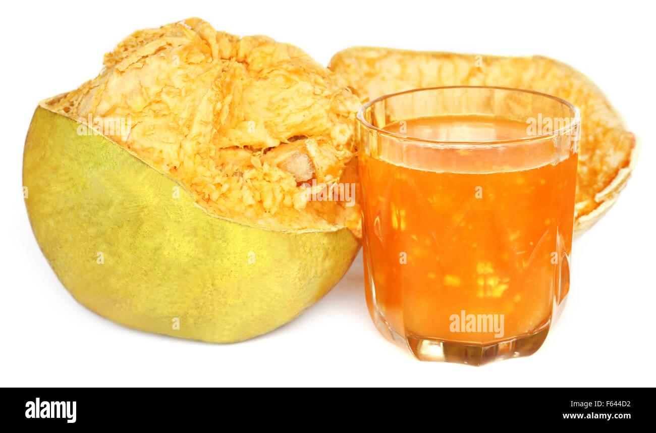 Medicinal Bael fruit with juice in a glass Stock Photo