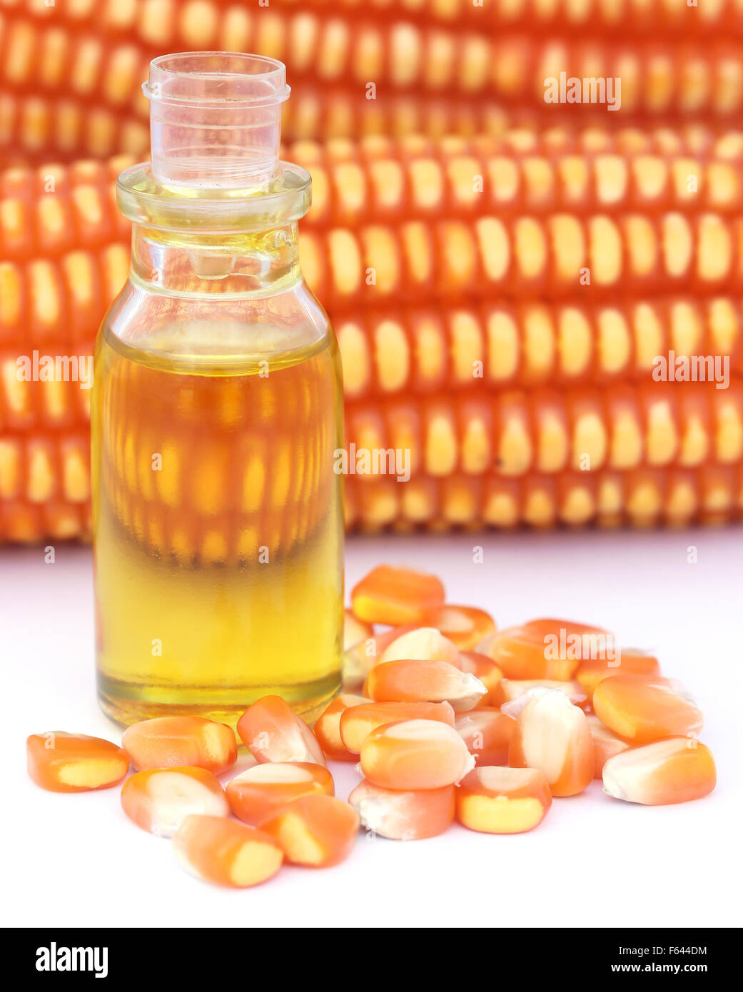 Oil with corn over white background Stock Photo