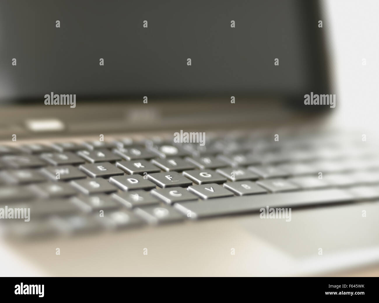 Notebook. Blurred background with modern laptop. Added diffusion effect Stock Photo