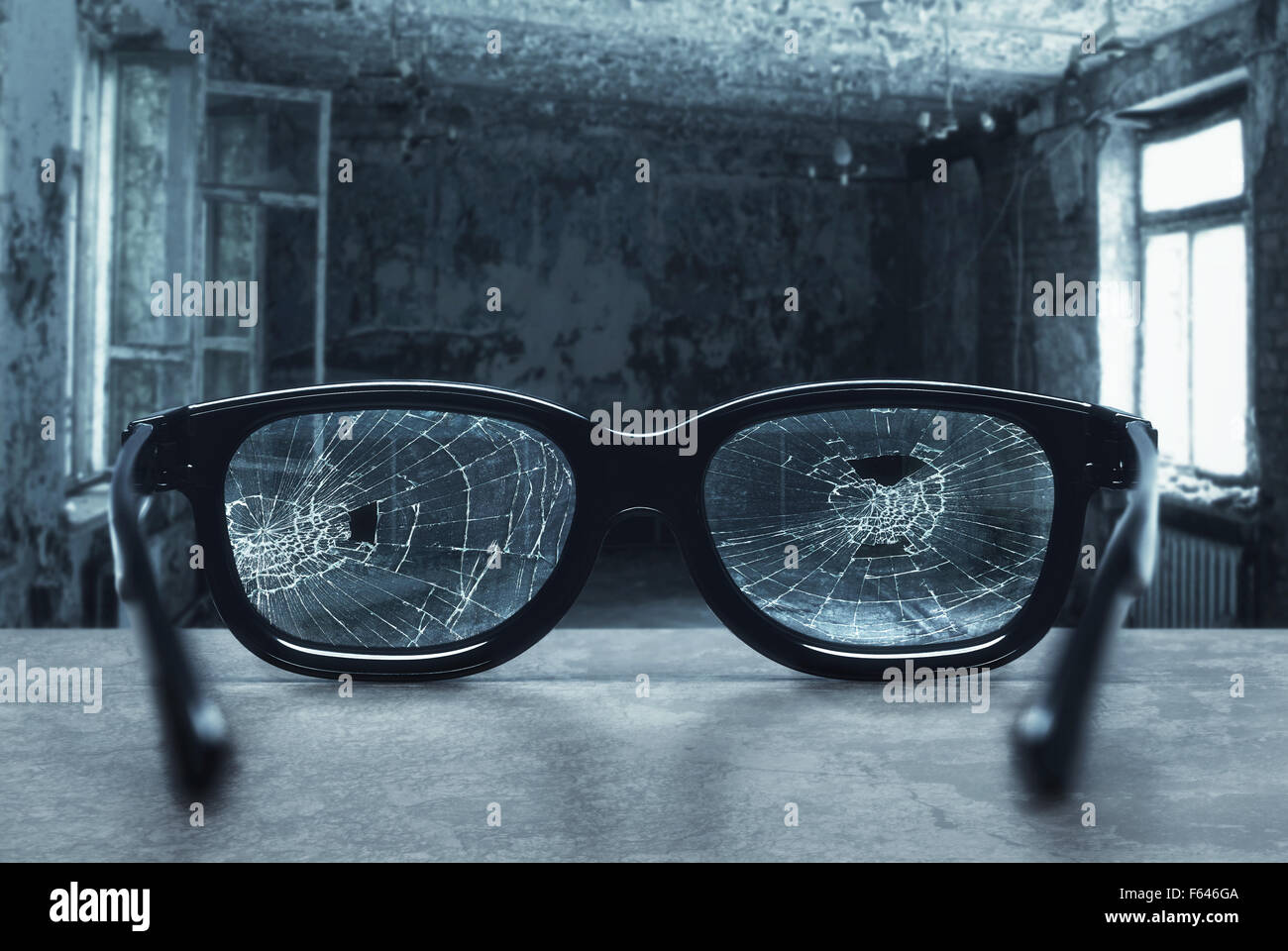 Broken eyeglasses with cracks in an old room Stock Photo Alamy