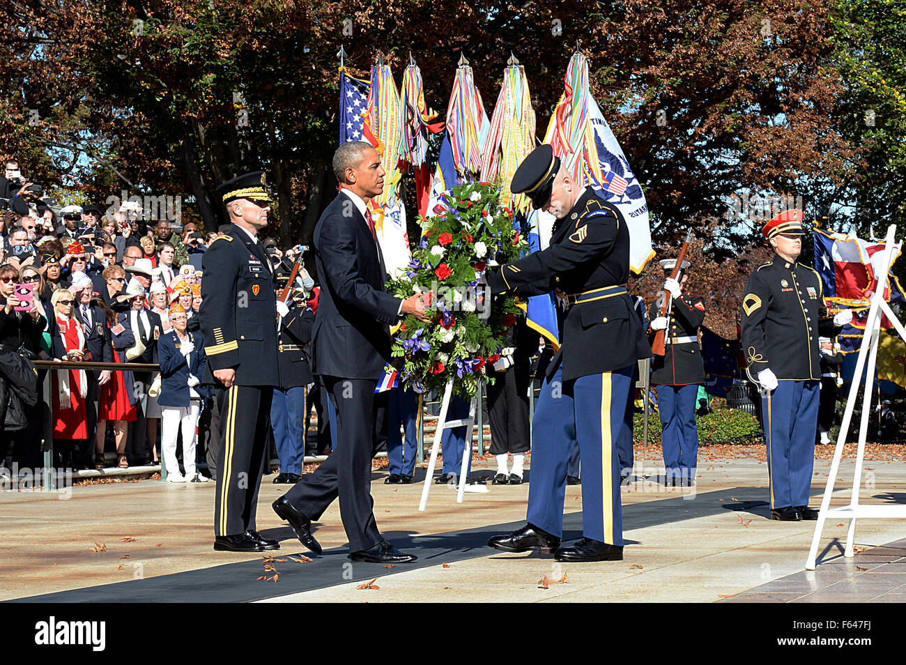 Arlington National Cemetery, USA. 11th November, 2015. U.S. President Barack Obama places a wreath in honor of Veterans Day at Arlington National Cemetery November 11, 2015 in Arlington, Virginia. Stock Photo