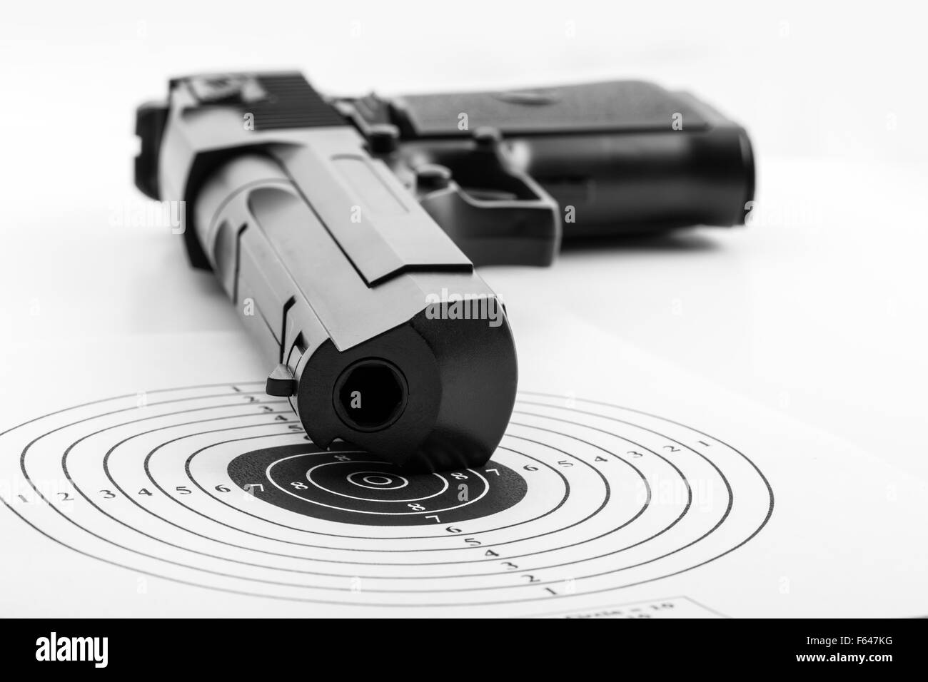 Paper target and airgun on white Stock Photo