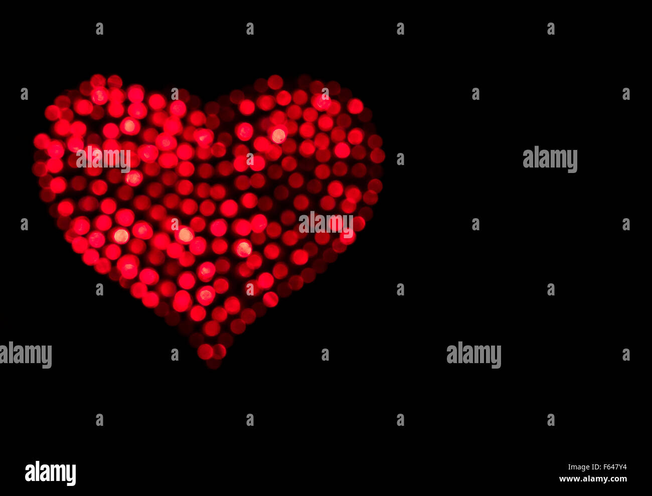 Red heart on black background Stock Photo Alamy