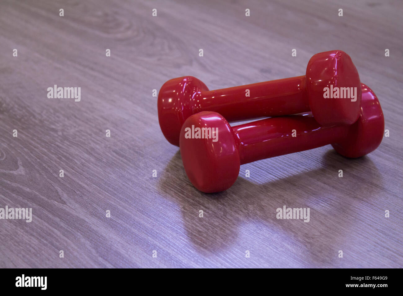 A pair of dumbbell weights Stock Photo Alamy