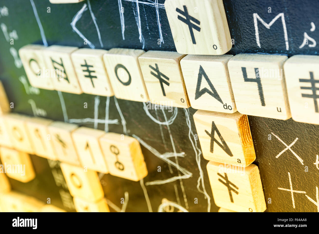 Hieroglyphes on crossword puzzle closeup Stock Photo