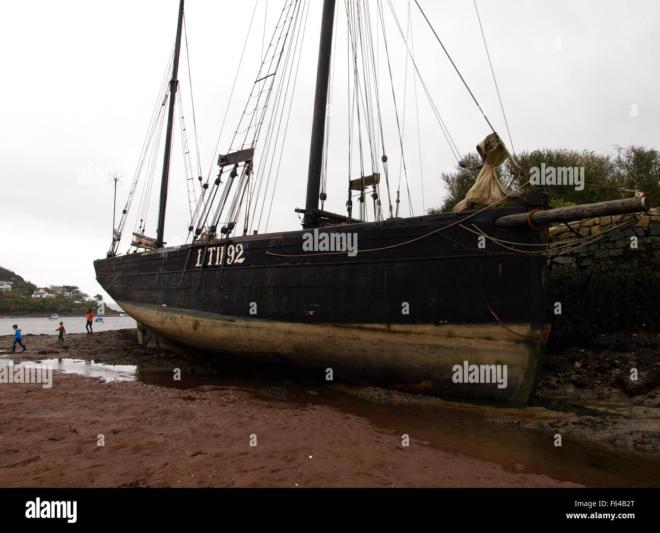 Keewaydin  number LT 1192, A Lowestoft Sailing Smack, at  low tide, Restronguet Creek, Falmouth, Cornwall, UK Stock Photo