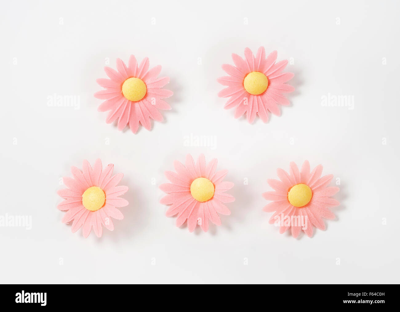 sugar flowers - eatable cake decoration on white background Stock Photo