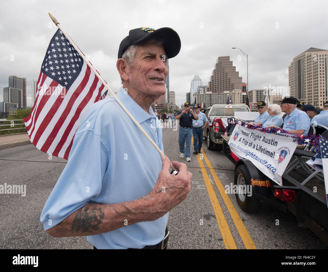 Austin, Texas USA November 11, 2015: Joe Barger of Austin waits during the Veteran's Day parade up Congress Avenue and ceremony at the Texas Capitol. Several thousand Texans lined Congress Avenue to witness military heroes, marching bands and floats in the annual parade. Credit:  Bob Daemmrich/Alamy Live News Stock Photo