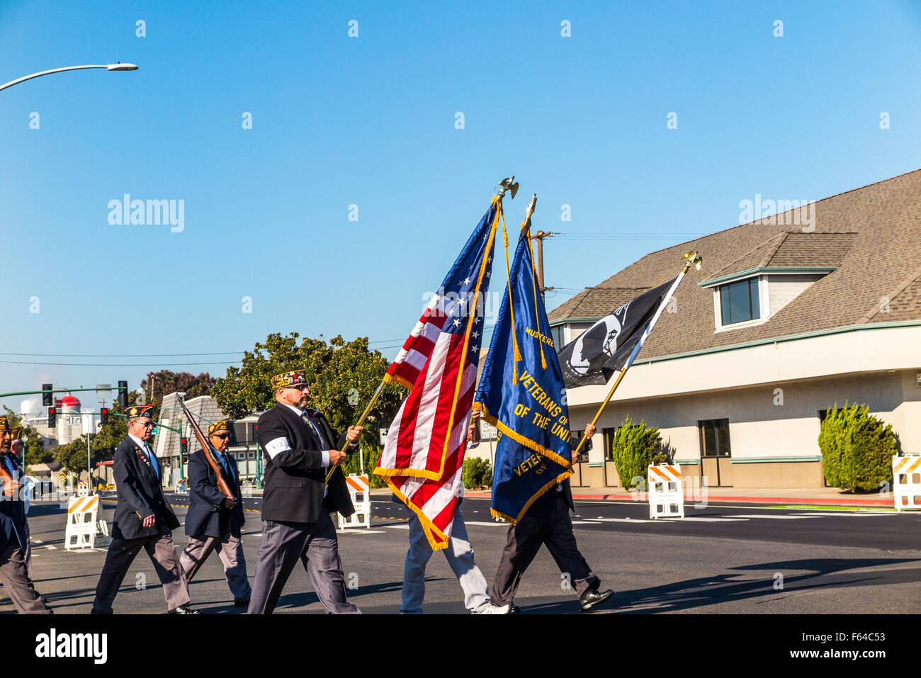 Carrying flags hires stock photography and images Alamy