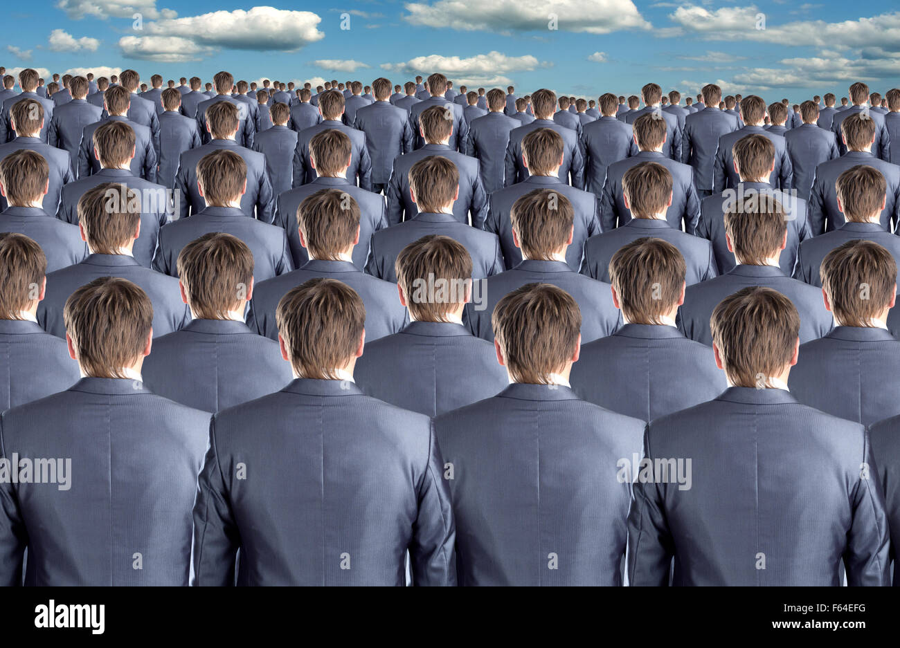Rear view of many identical businessmen clones Stock Photo