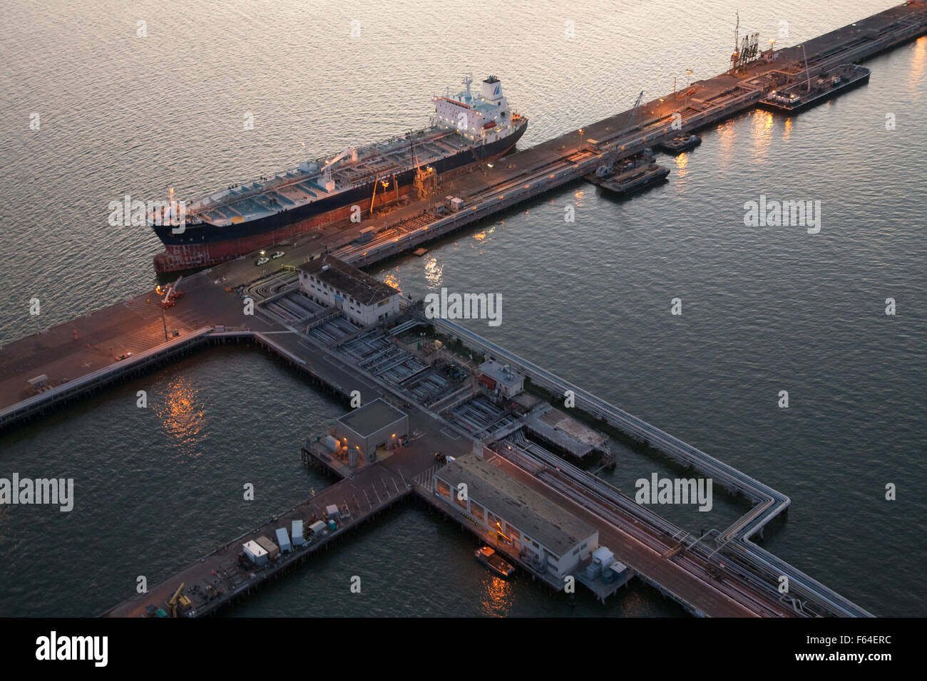 oil tanker at the Long Wharf Richmond CA aerial twilight night evening view Stock Photo