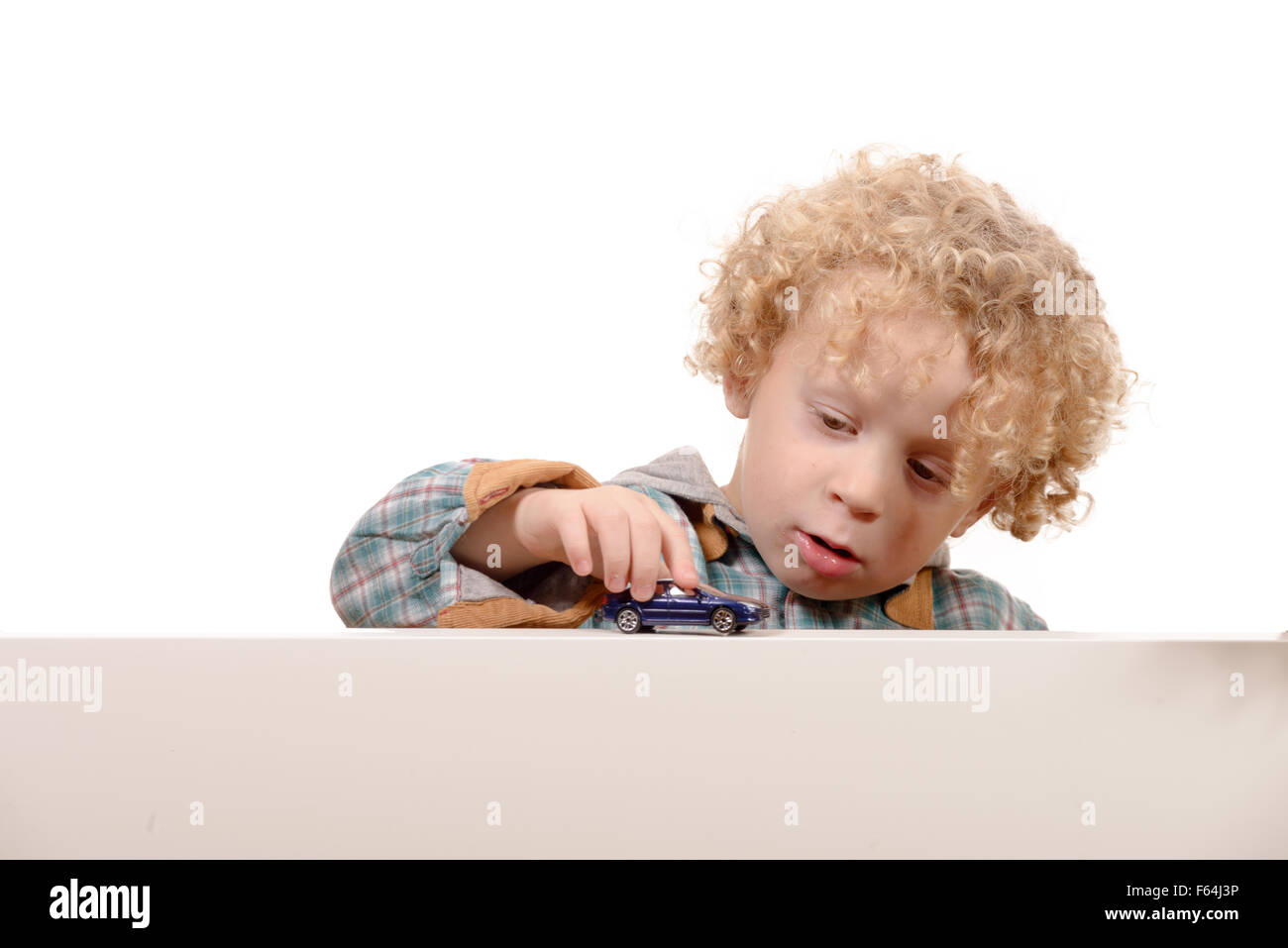 Little boy with toy car Stock Photo - Alamy