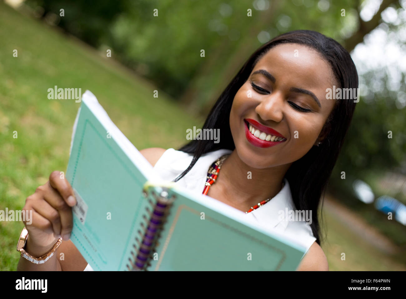 student reading her textbook Stock Photo