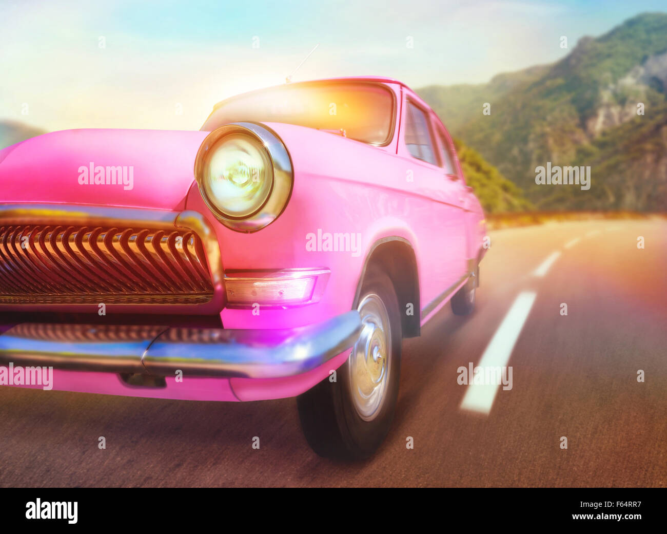 Pink Retro Car On The Road In Mountains Stock Photo Alamy