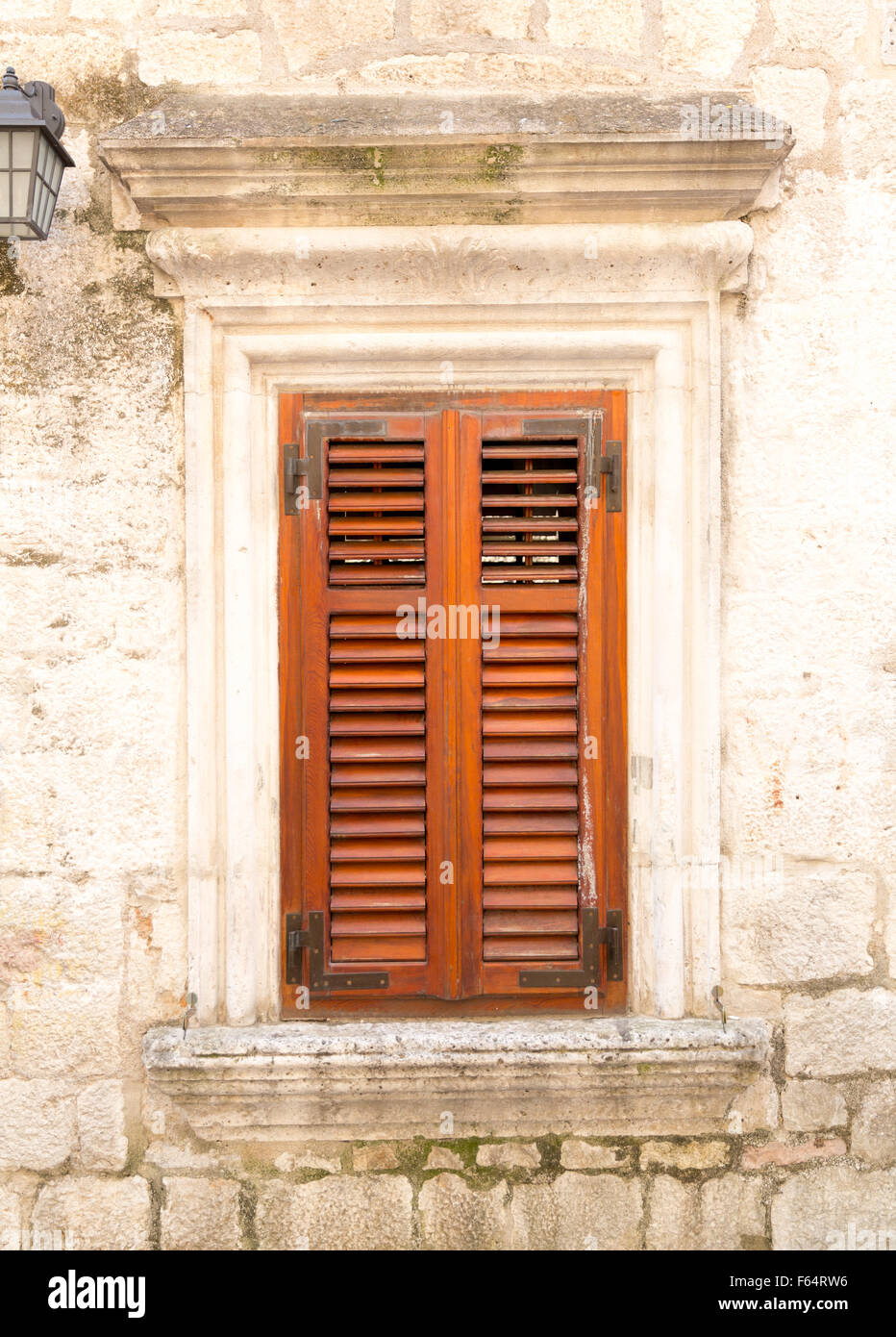 Old stone wall with wooden window Stock Photo - Alamy