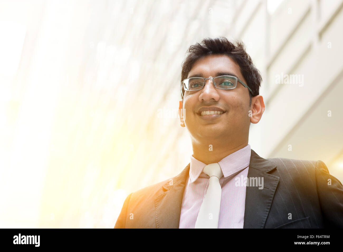 Indian business man smiling hi-res stock photography and images - Alamy