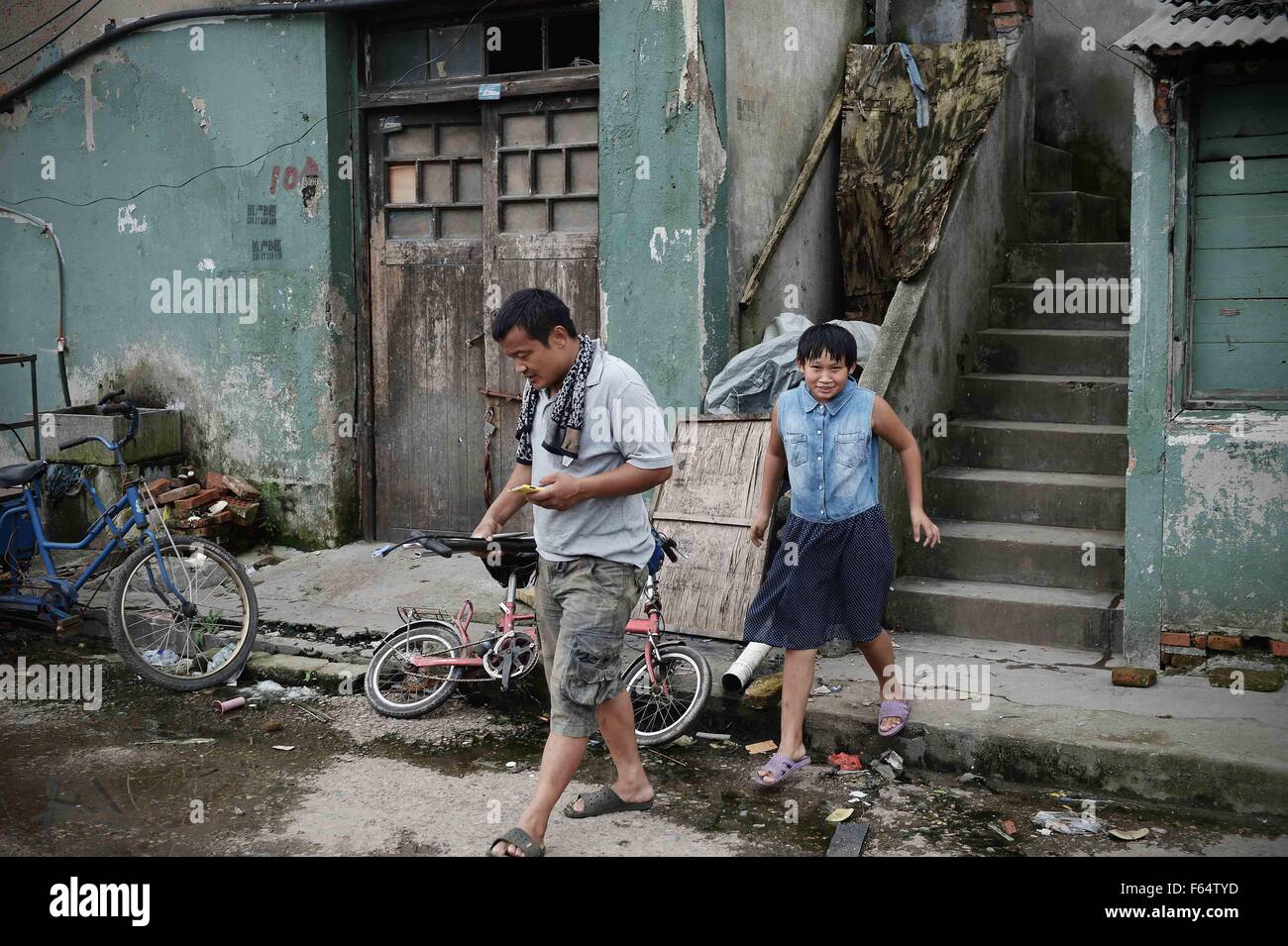 Shanghai, Shanghai, CHN. 25th Aug, 2014. Shanghai, CHINA - August 25 2014: (EDITORIAL USE ONLY. CHINA OUT) Liu Jing's parents live on collecting garbage in Shanghai. And every summer she goes to Shanghai from Yancheng Jiangsu to reunion with them as a migrant bird. © SIPA Asia/ZUMA Wire/Alamy Live News Stock Photo