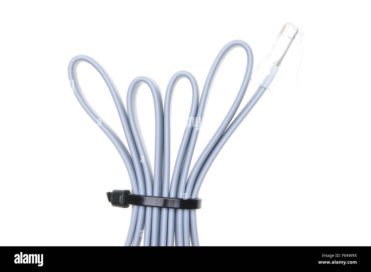 Patch cord with RJ45 plugs and cable ties isolated over white