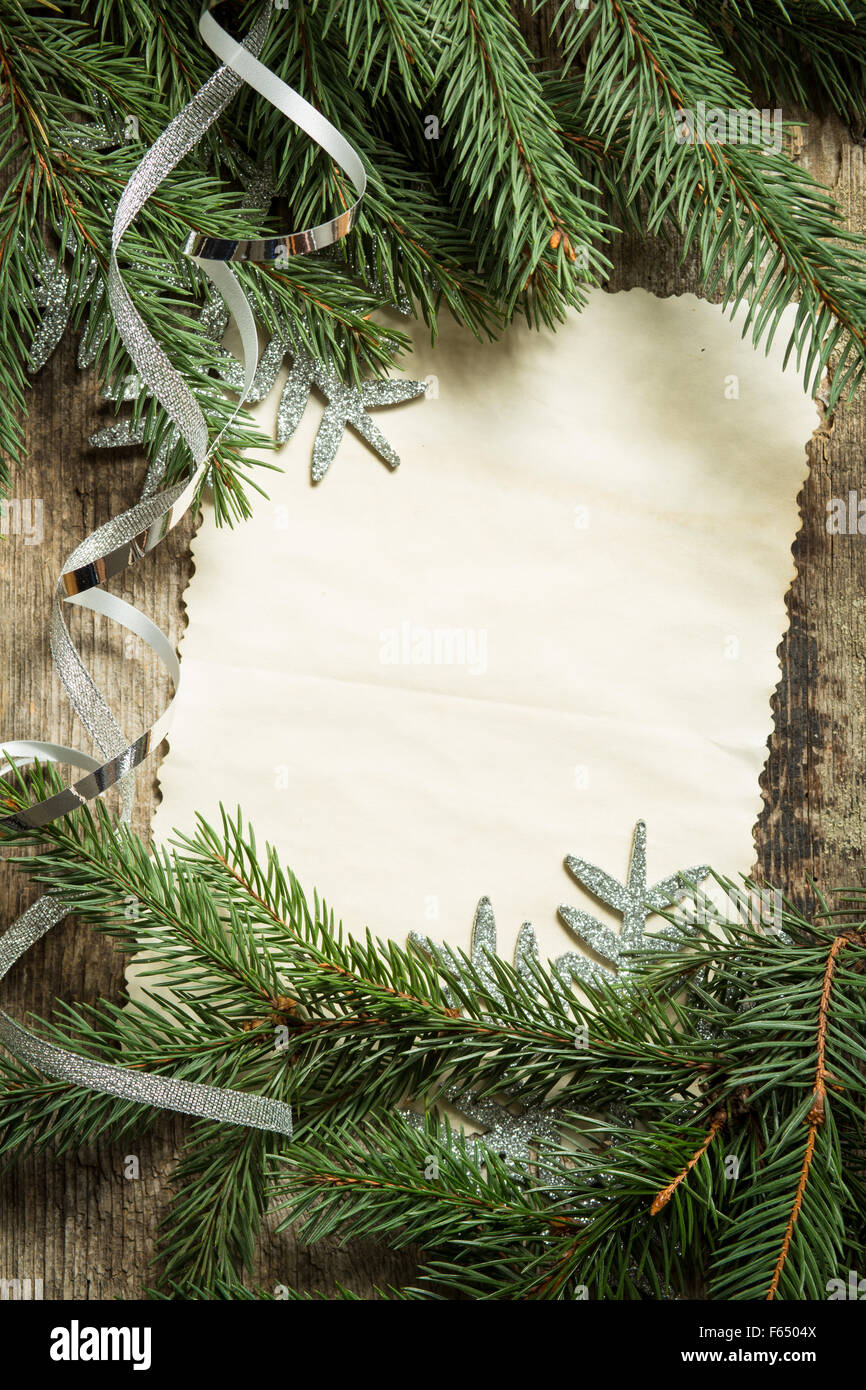 christmas tree branches with blank paper card and silver ribbon on wooden background top view image of christmas decoration - Blank Christmas Tree christmas tree branches with blank paper card and silver ribbon on wooden background top view image of christmas decoration - Blank Christmas Tree