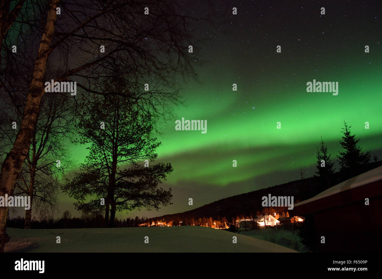 fantastic aurora borealis, northern light on cold arctic winter sky