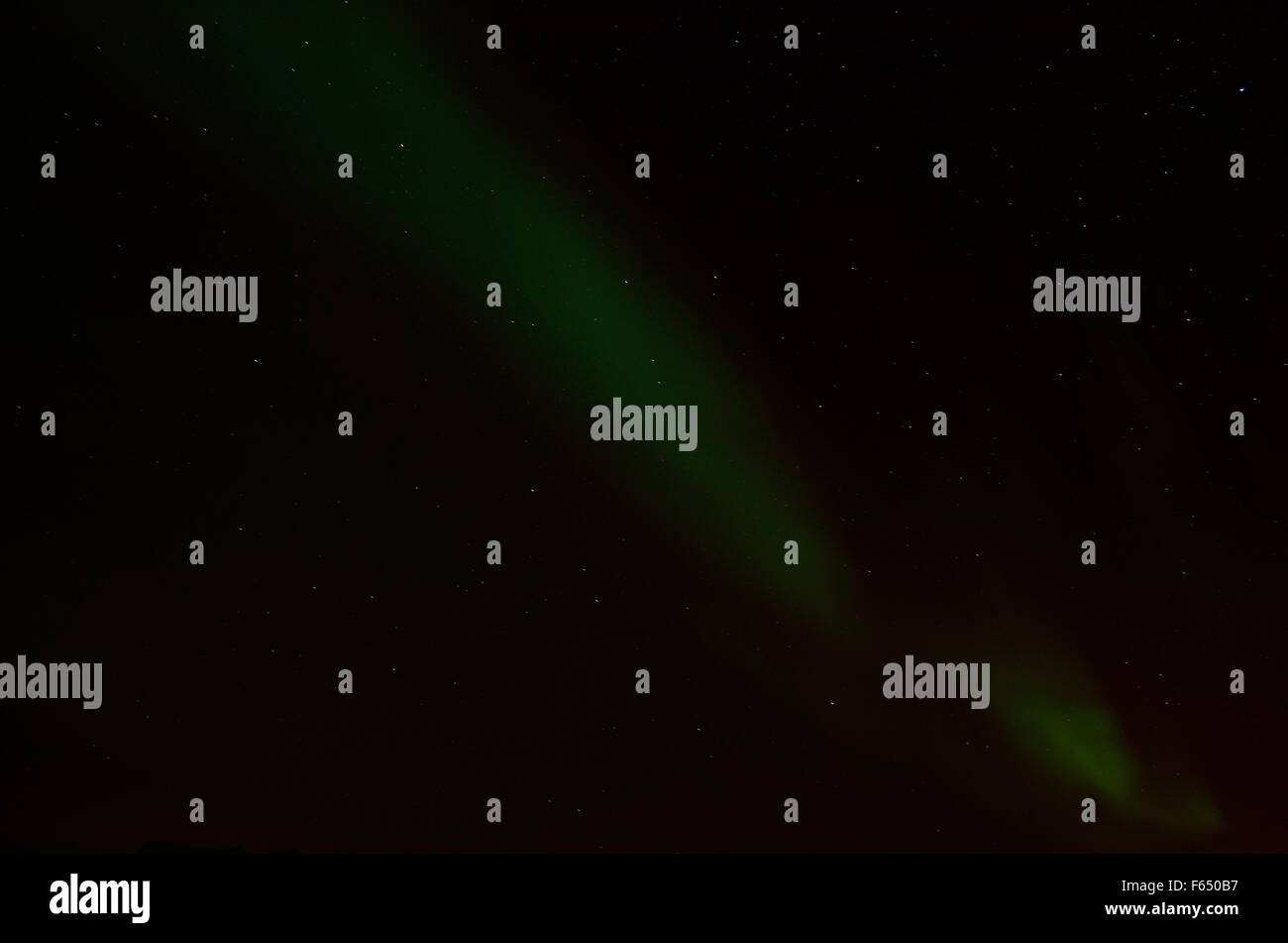 fantastic aurora borealis, northern light on cold arctic winter sky