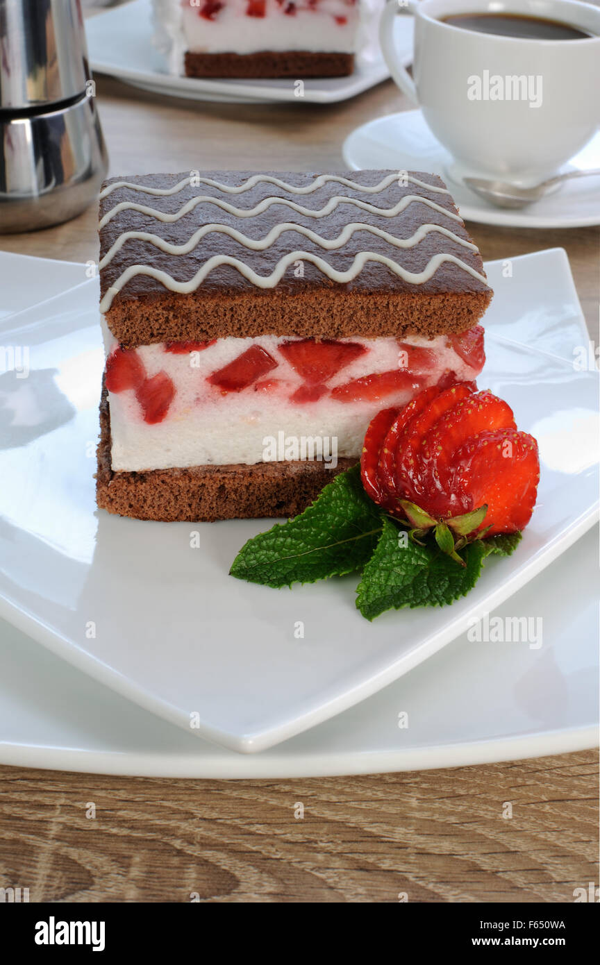 Strawberry souffle on a chocolate sponge cake Stock Photo Alamy