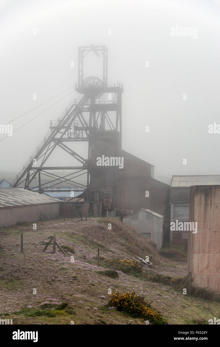 Fog over the Geevor Tin Mine heritage center in Cornwall, England, United Kingdom, UK Stock Photo