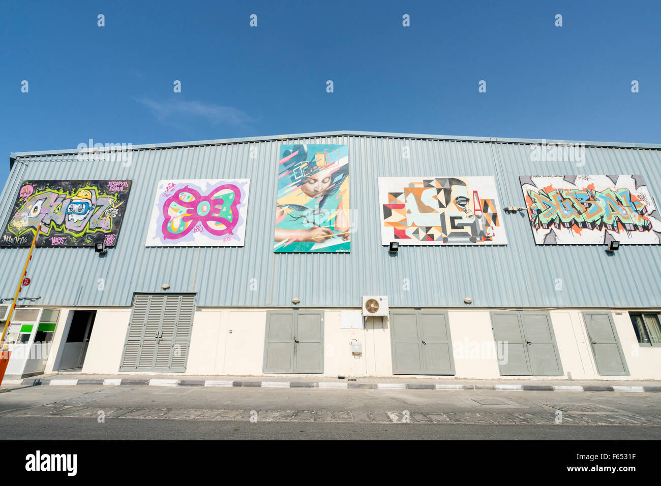 Paintings on warehouse wall at Alserkal art district in Al Quoz Dubai United Arab Emirates Stock Photo
