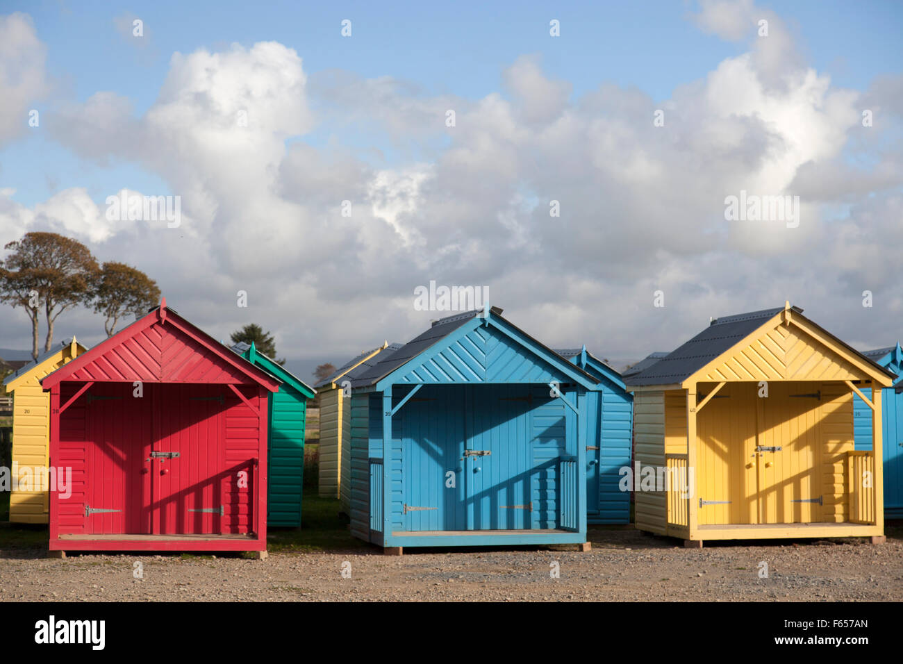 Colourful beach huts stored for the winter at Llanbedrog Beach North Wales Stock Photo