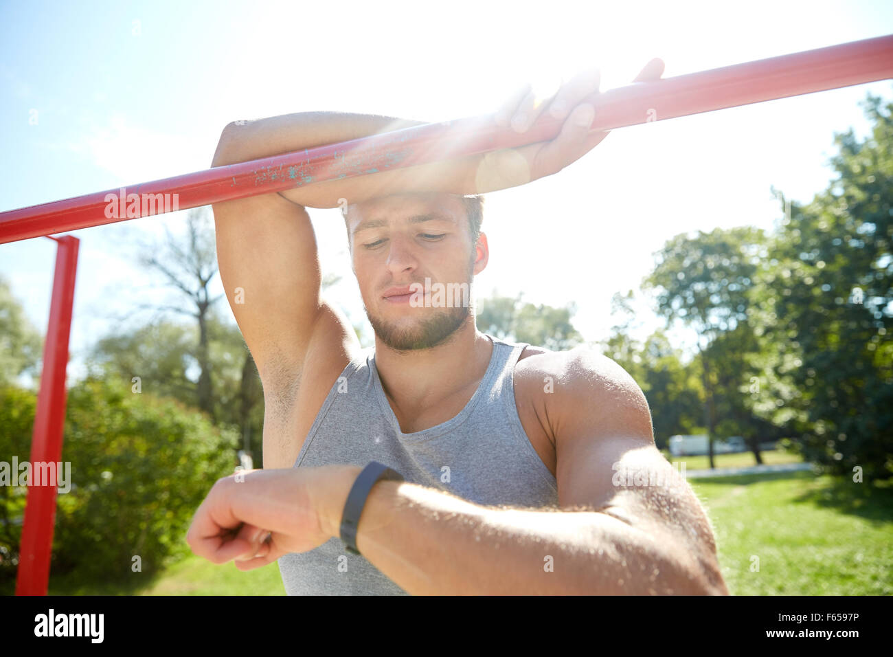 man with heartrate watch exercising outdoors Stock Photo Alamy