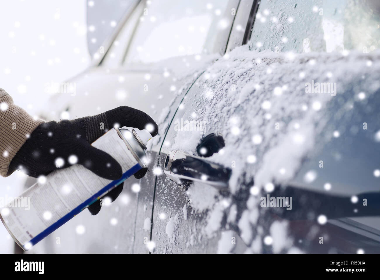 closeup of man hand with lock door deicer Stock Photo Alamy