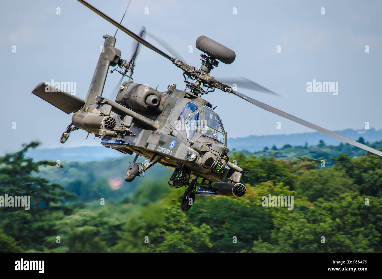 AgustaWestland Apache is a licence-built version of the AH-64D Apache Longbow attack helicopter for the British Army. Down in trees. Tank killer Stock Photo