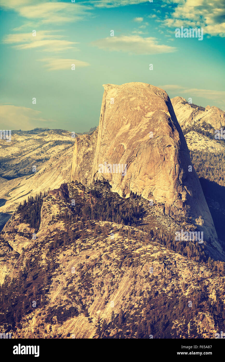 Old film retro toned Half Dome rock formation, Yosemite National Park, USA. Stock Photo