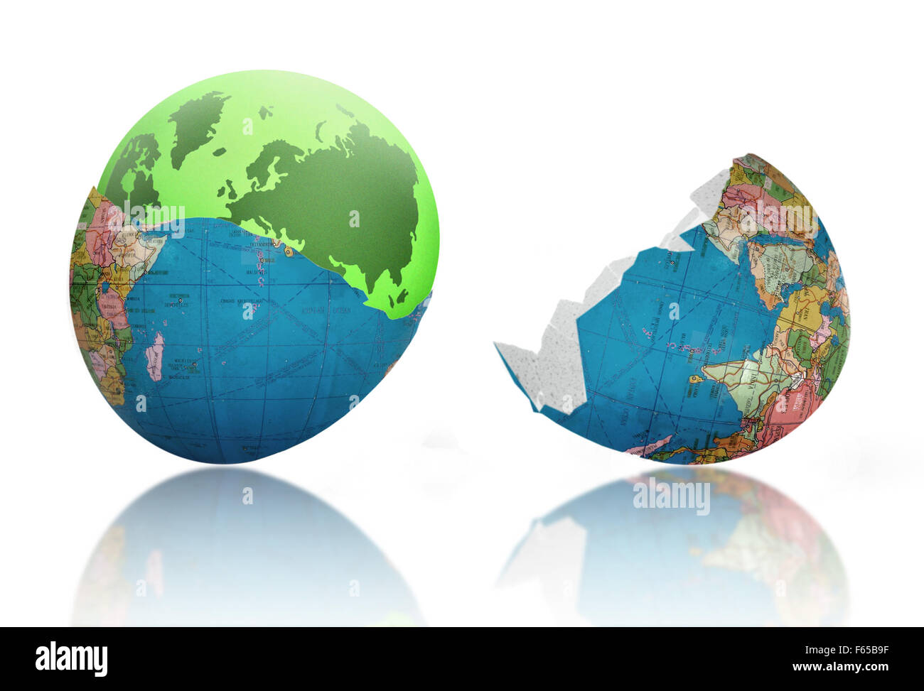 Green earth emerging from cracked egg shell world Stock Photo Alamy