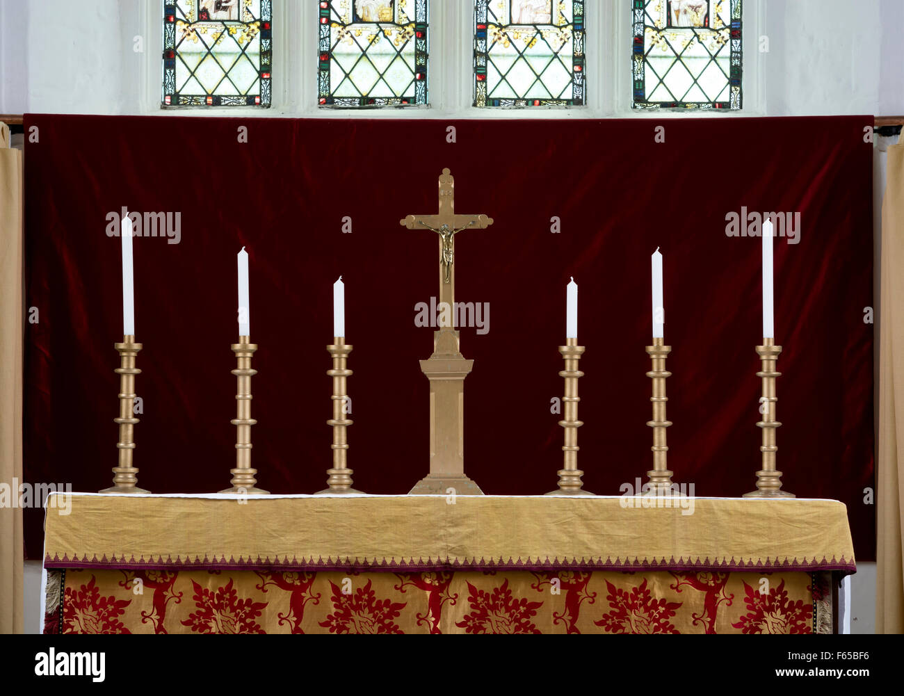 Altar and candles, All Saints Church, Sudborough, Northamptonshire