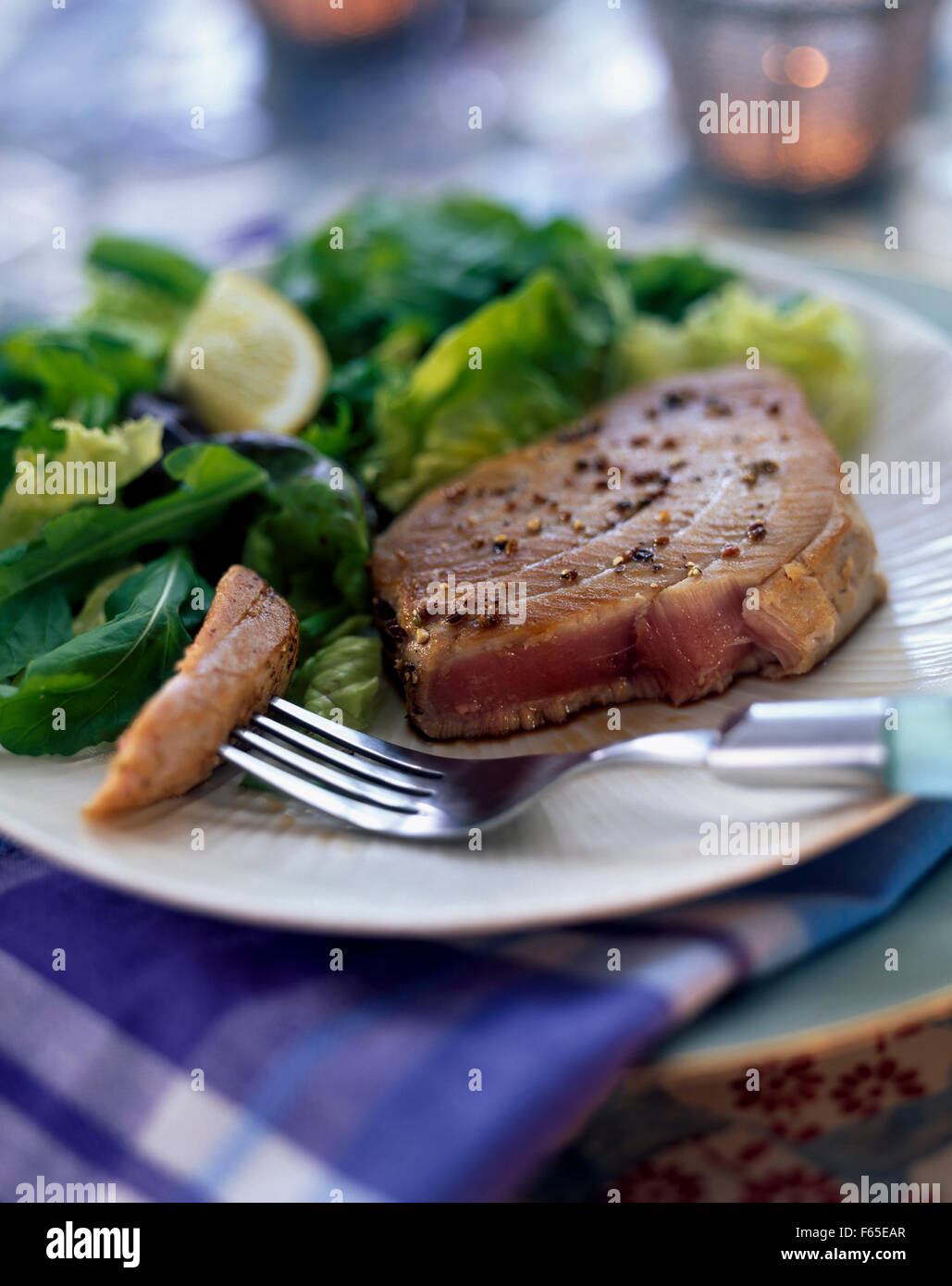 halfcooked tuna with herb leaf salad Stock Photo Alamy