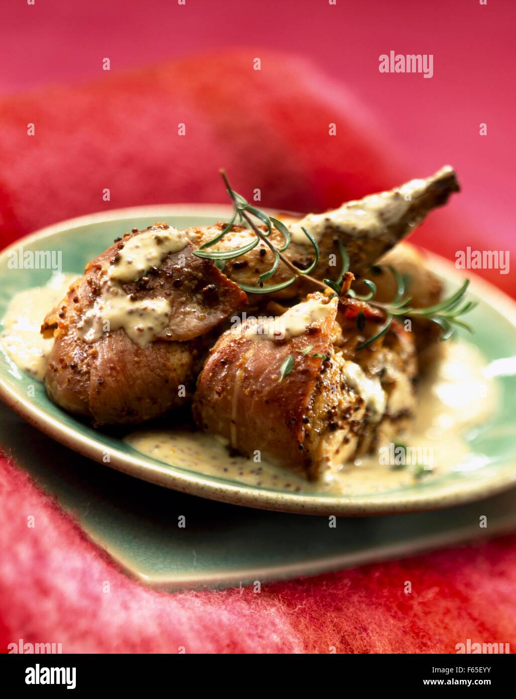 Rabbit in mustard sauce Stock Photo Alamy