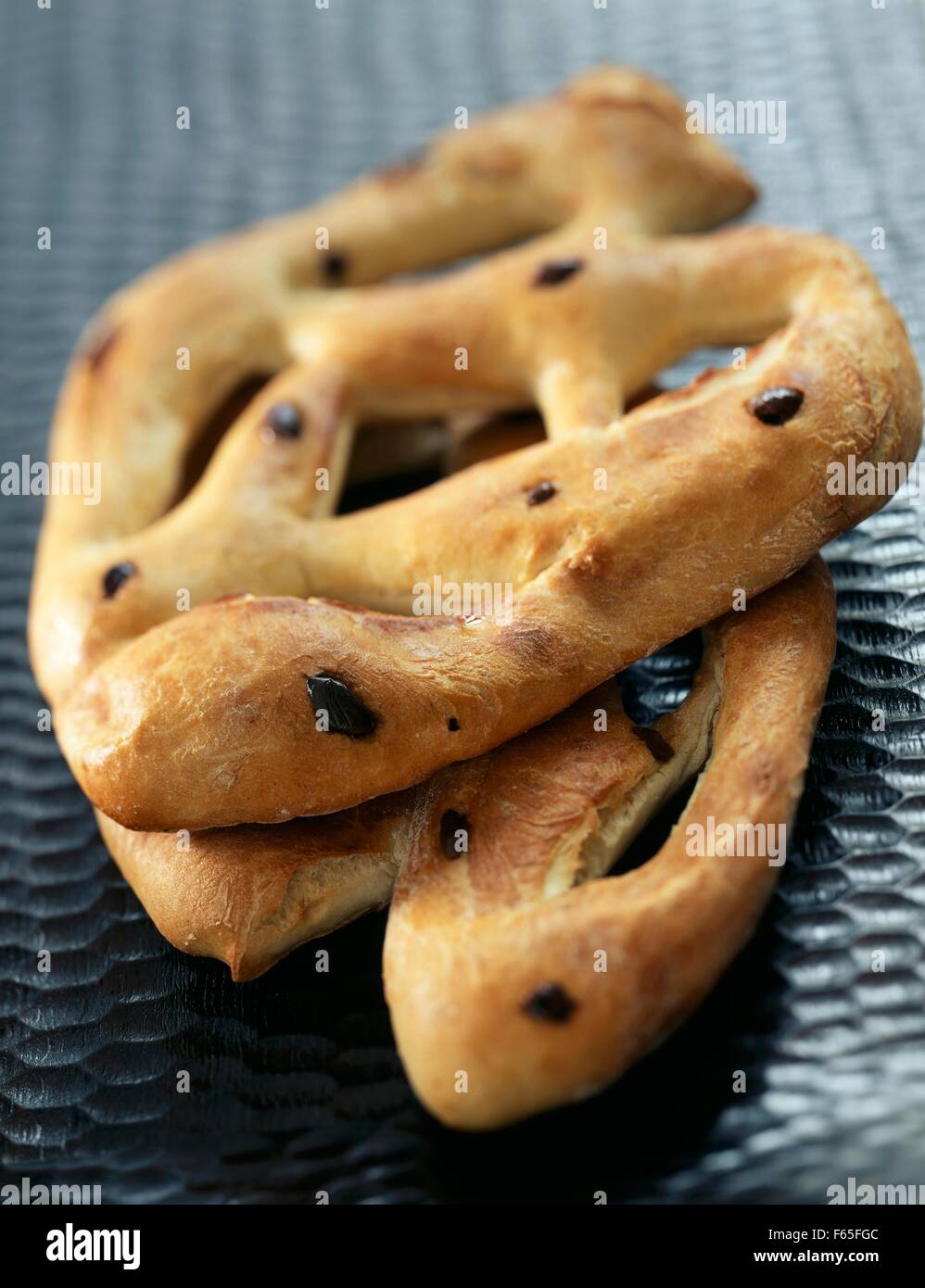Olive and anchovy fougasses Stock Photo