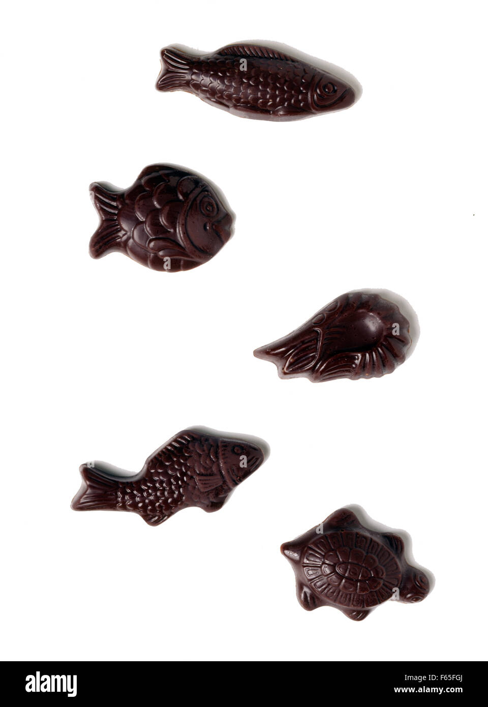 Fish-shaped dark chocolates Stock Photo - Alamy