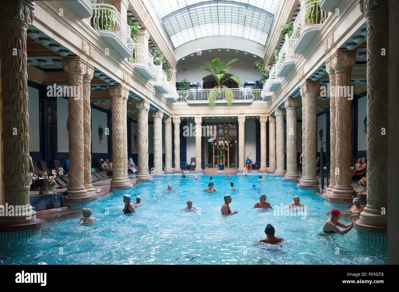The swimming pool in the main hall of the art nouveau Gellért Baths ...