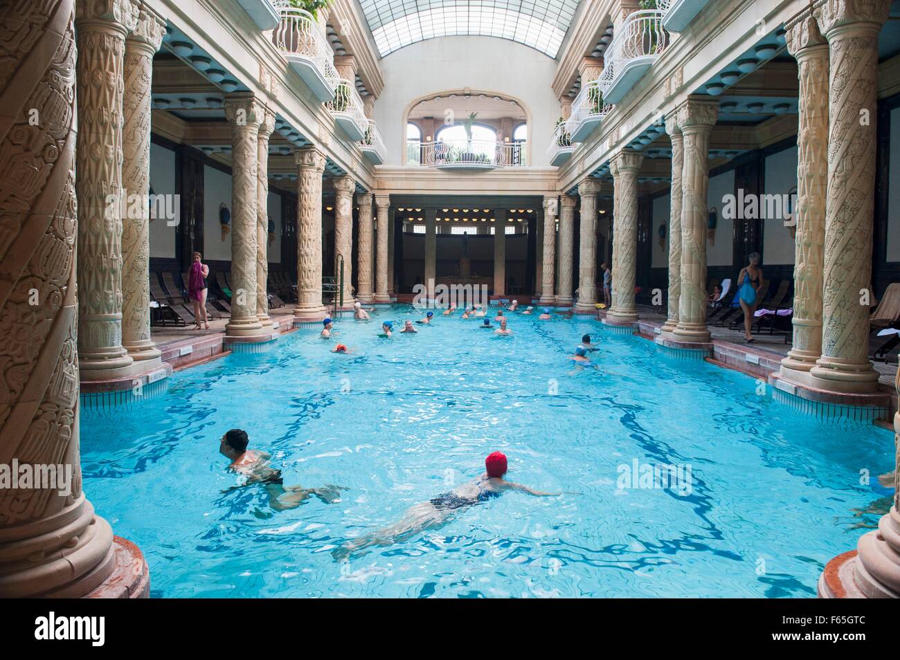 The main hall of the art nouveau style Gellért Thermal Baths with swimming pool and pillars, Budapest, Hungary Stock Photo