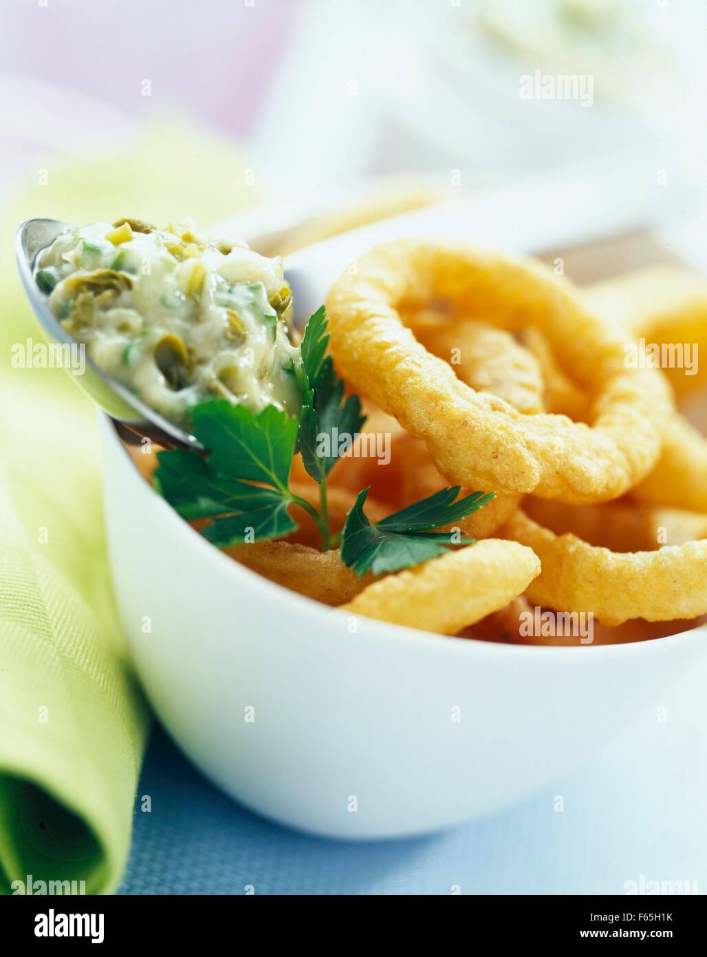 Onion fritters with tartare sauce Stock Photo