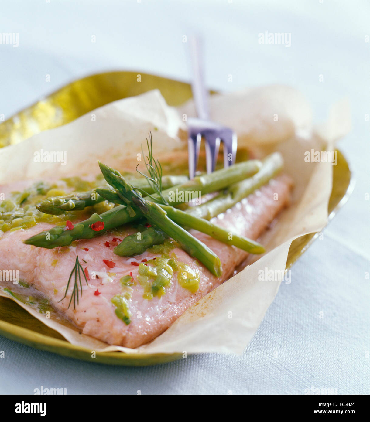 salmon and asparagus en papillote  (topic: family meals) Stock Photo