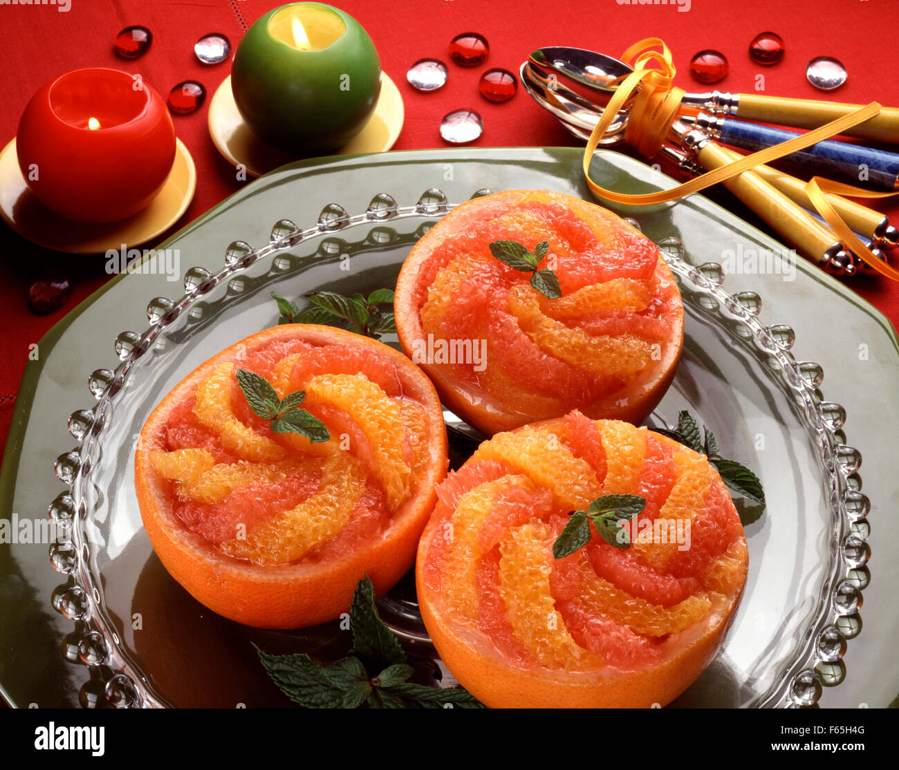 Grapefruit with citrus fruit and Calisson ice cream Stock Photo Alamy
